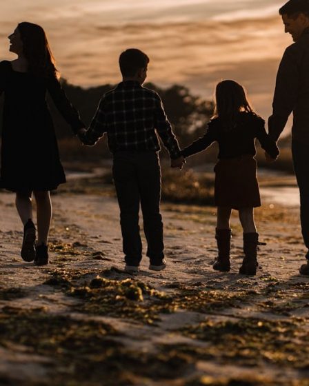 Family walk at sunset