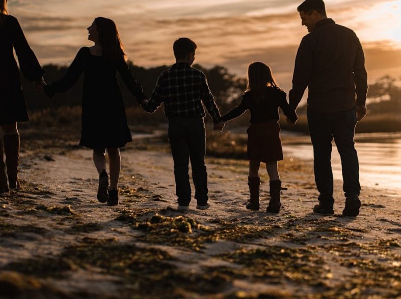 Family walk at sunset